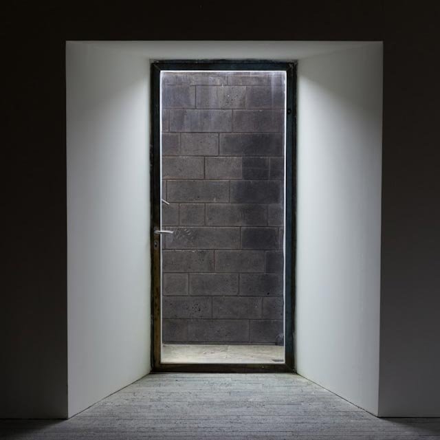 New Year resolutions symbolized by a doorway and threshold